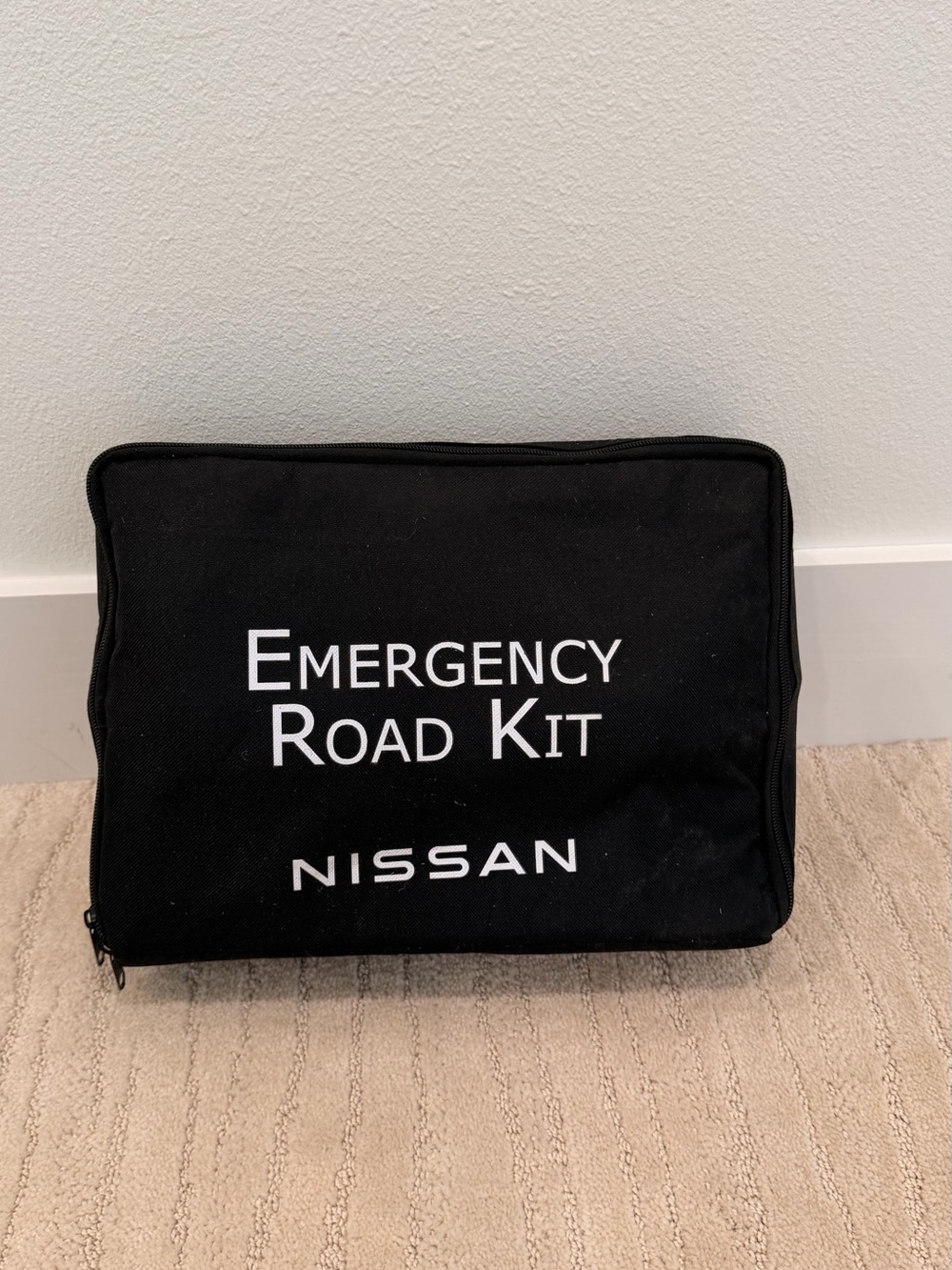 Complete Nissan Emergency Road Kit + First Aid Kit Bundle for Vehicle Safety